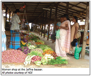 Women shop at the Jaffna bazaar.